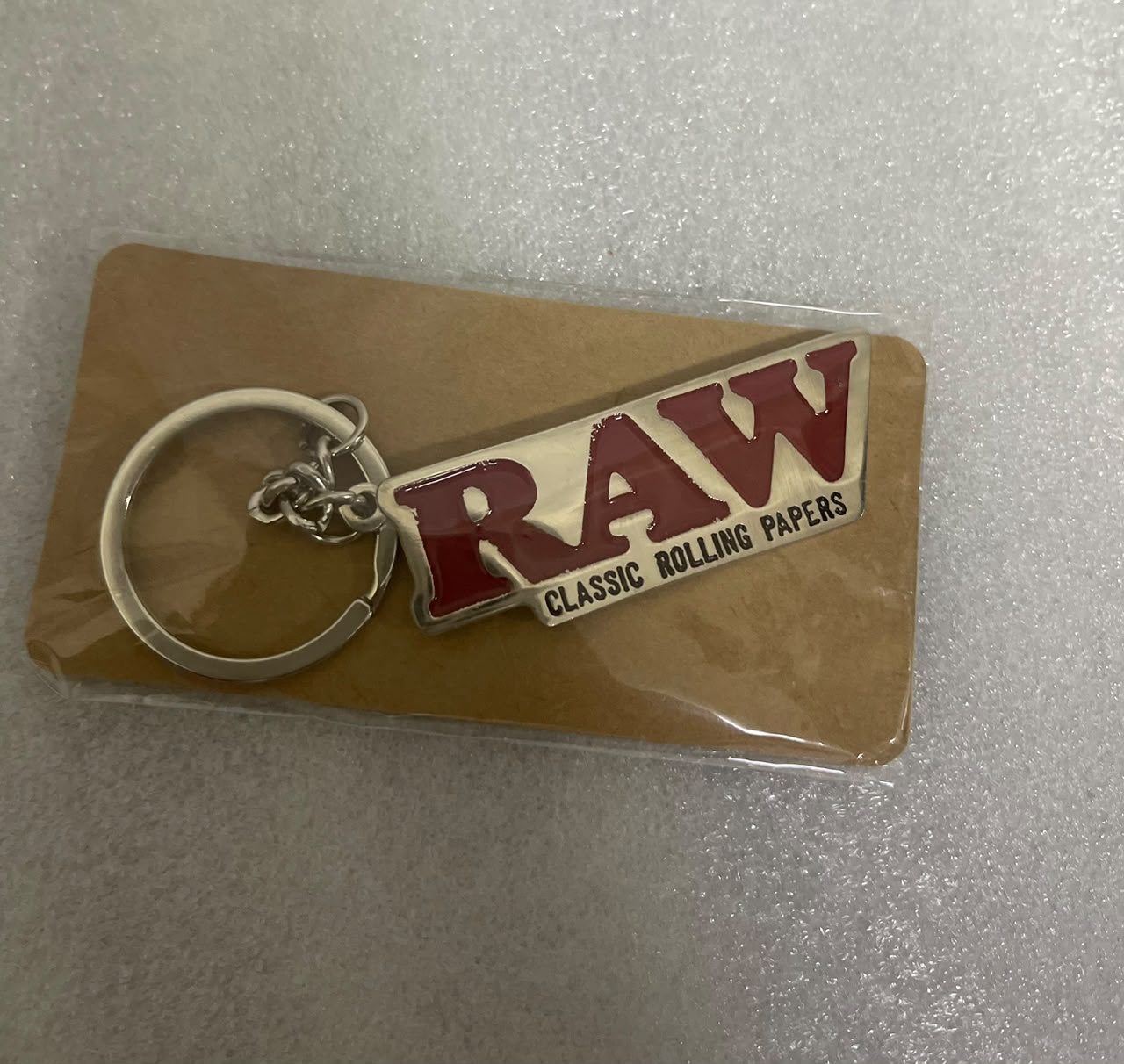 Llavero Metalico RAW Classic Rolling Papers.